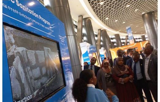 Visitors at the Innovation Centre sanitation exhibit